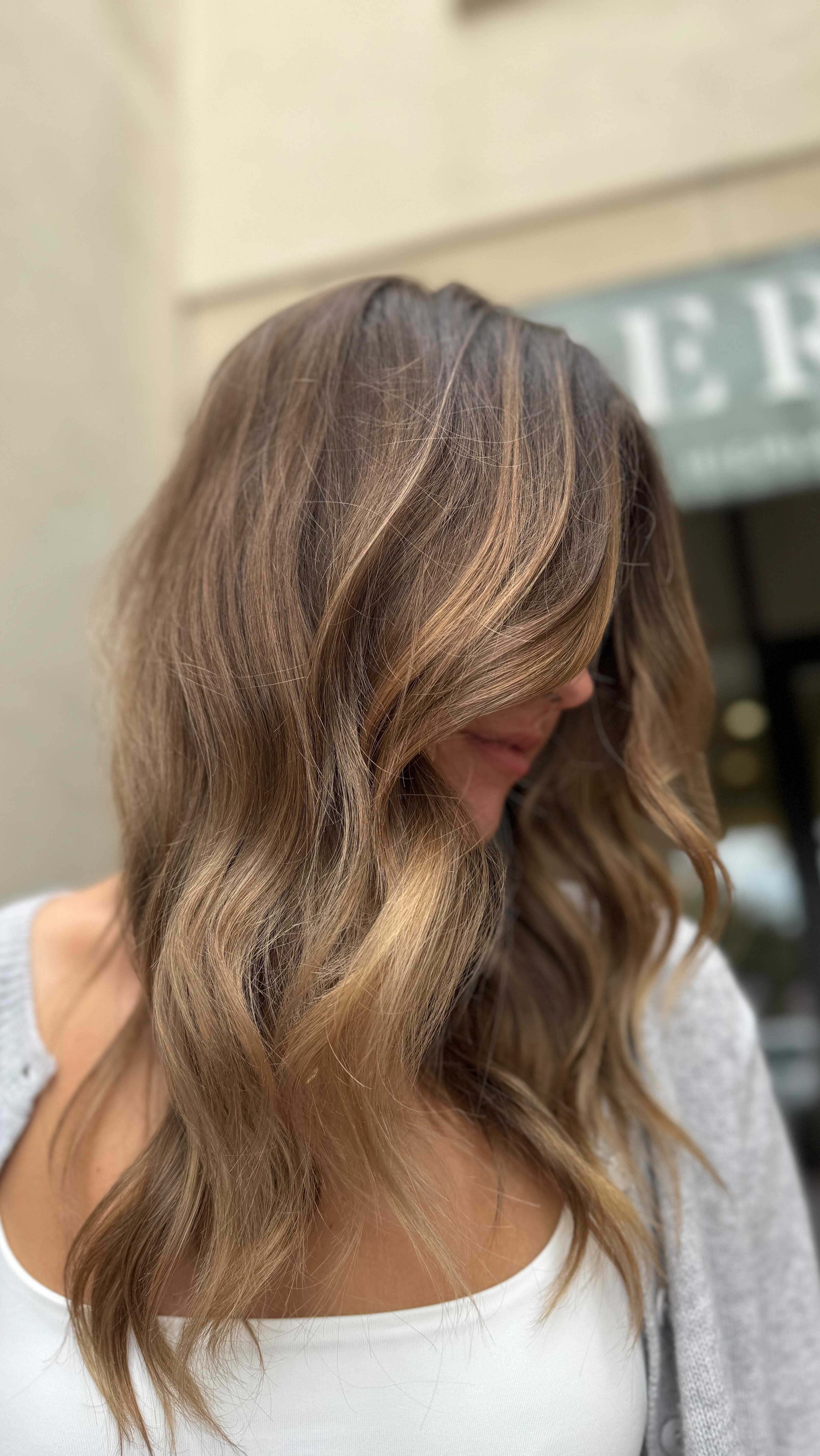 When a client asks to go darker for fall, @ernann never disappoints!🍂
 Sealing the color with @kerastase_official Chroma Absolu Gloss to add shine and hydration to dry dull ends. 
Blowdry and beach waves done by Noemi @mimis.styles. 
📞214.219.3600 to schedule an appointment with Errin for a hair color makeover.